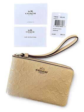 NWT Coach F58034 Signature Debossed Patent Leather Corner Zip Wristlet Platinum